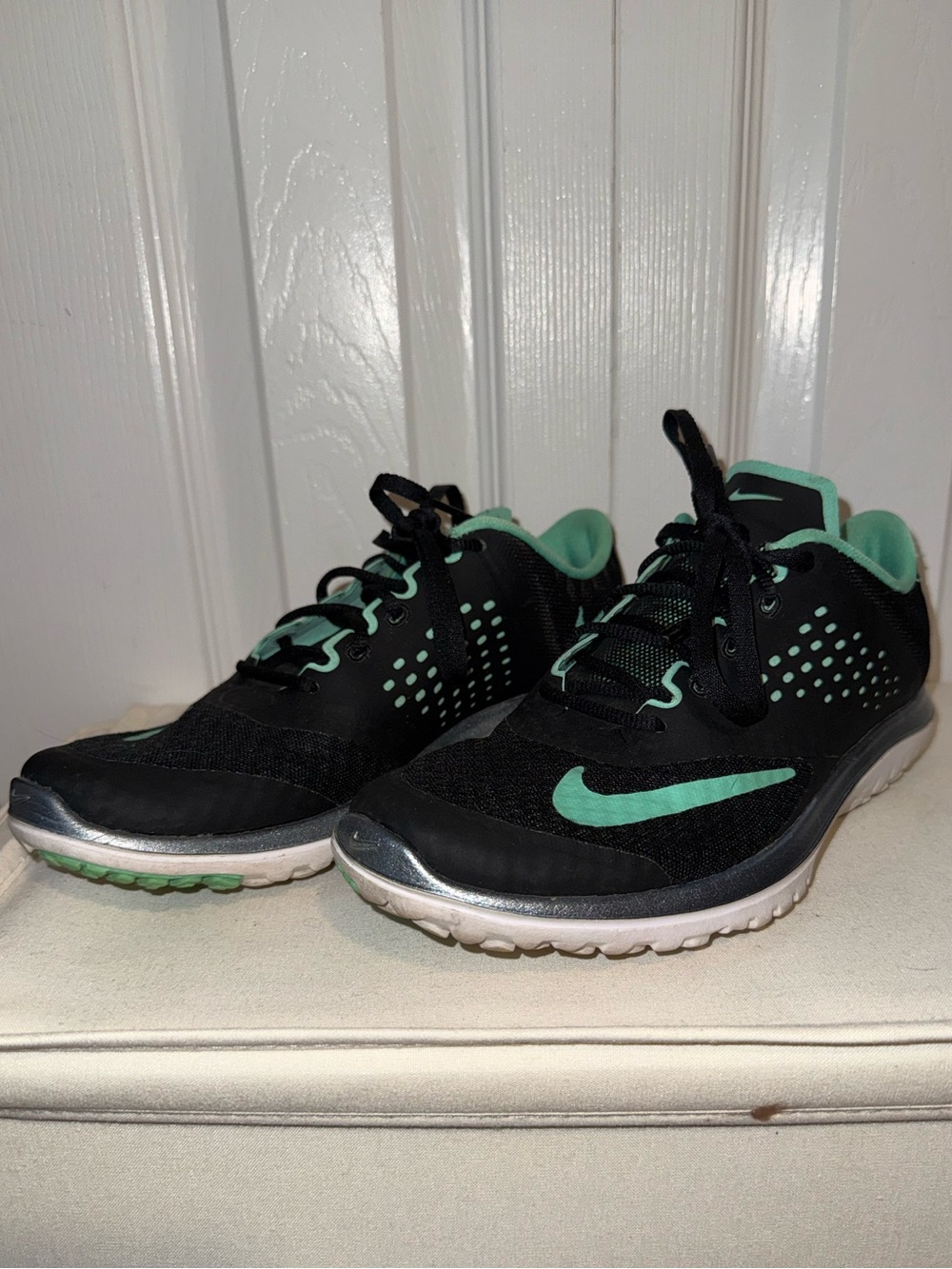 Nike women’s Black Sneakers with Mint Green Swoosh